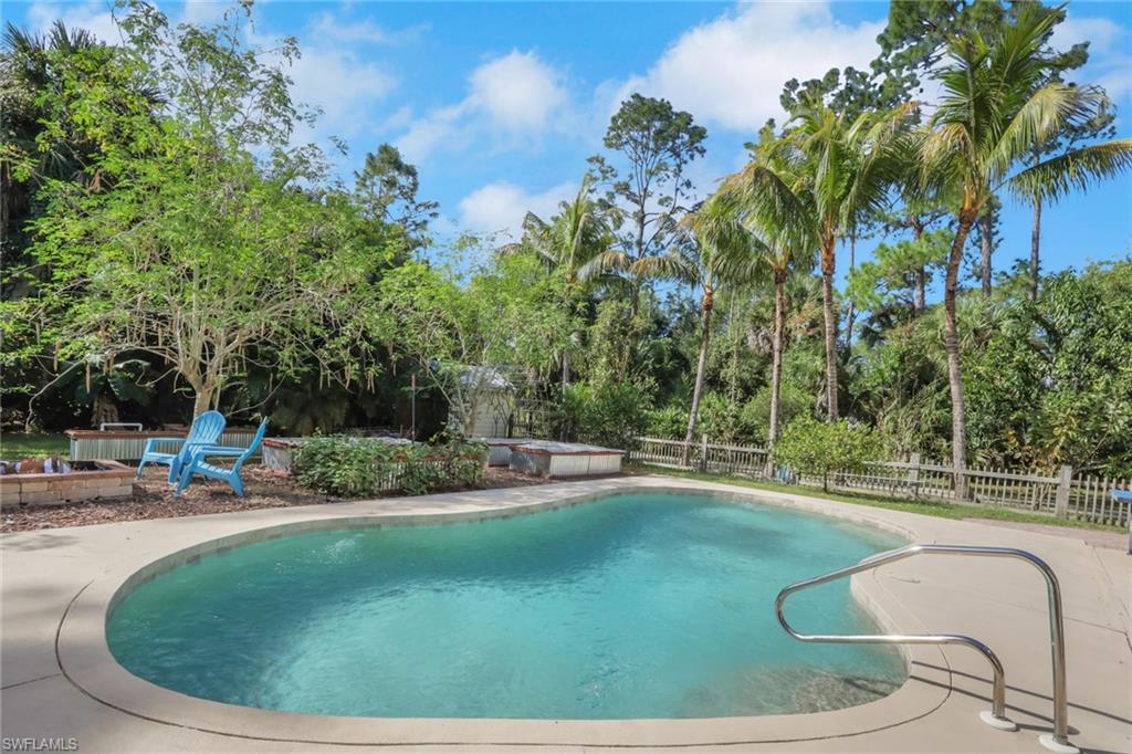 5092 Boxwood Way Naples, FL 34116 - Photo 24 of 48 Beautiful saltwater sports pool with a huge patio for seating, relaxing, and entertaining
