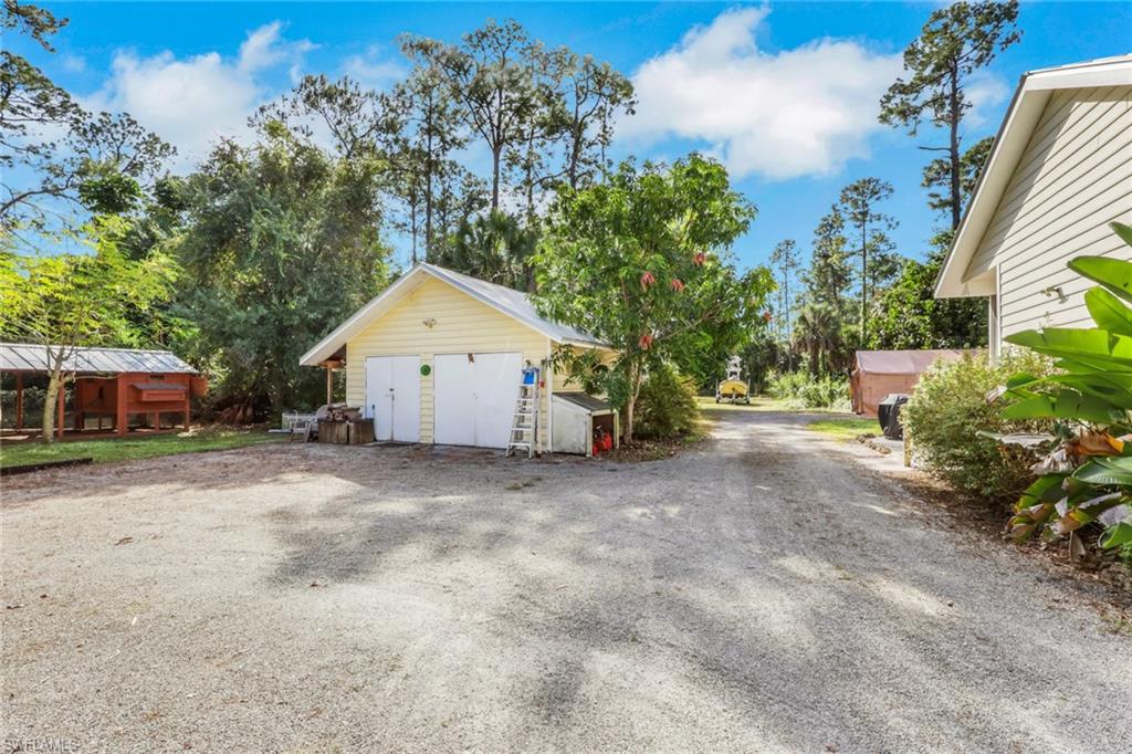 5092 Boxwood Way Naples, FL 34116 - Photo 29 of 48 Detached Workshop/2 Car garage, Chicken Coop, Guest House in the back