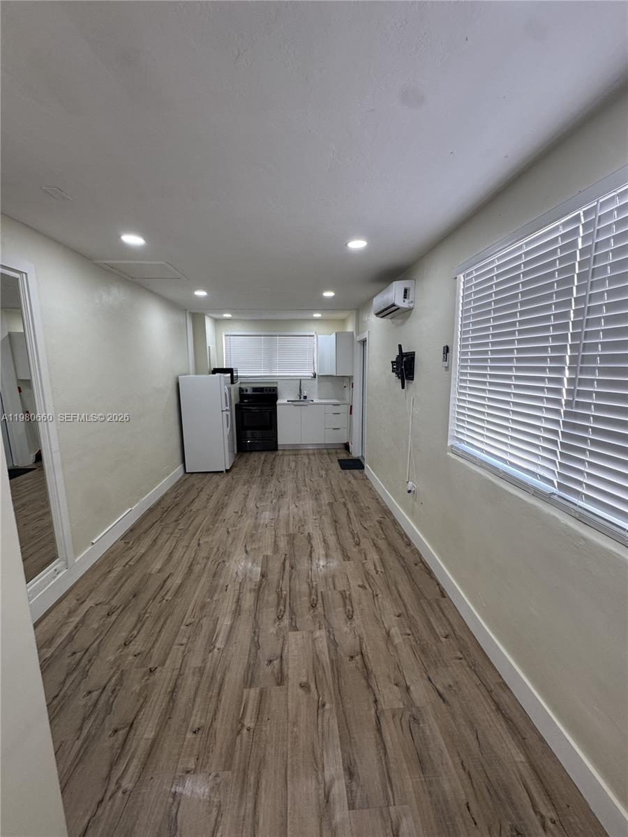 664 Colson Drive Key Largo, FL 33037 - Photo 19 of 23 a view of a room with wooden floor