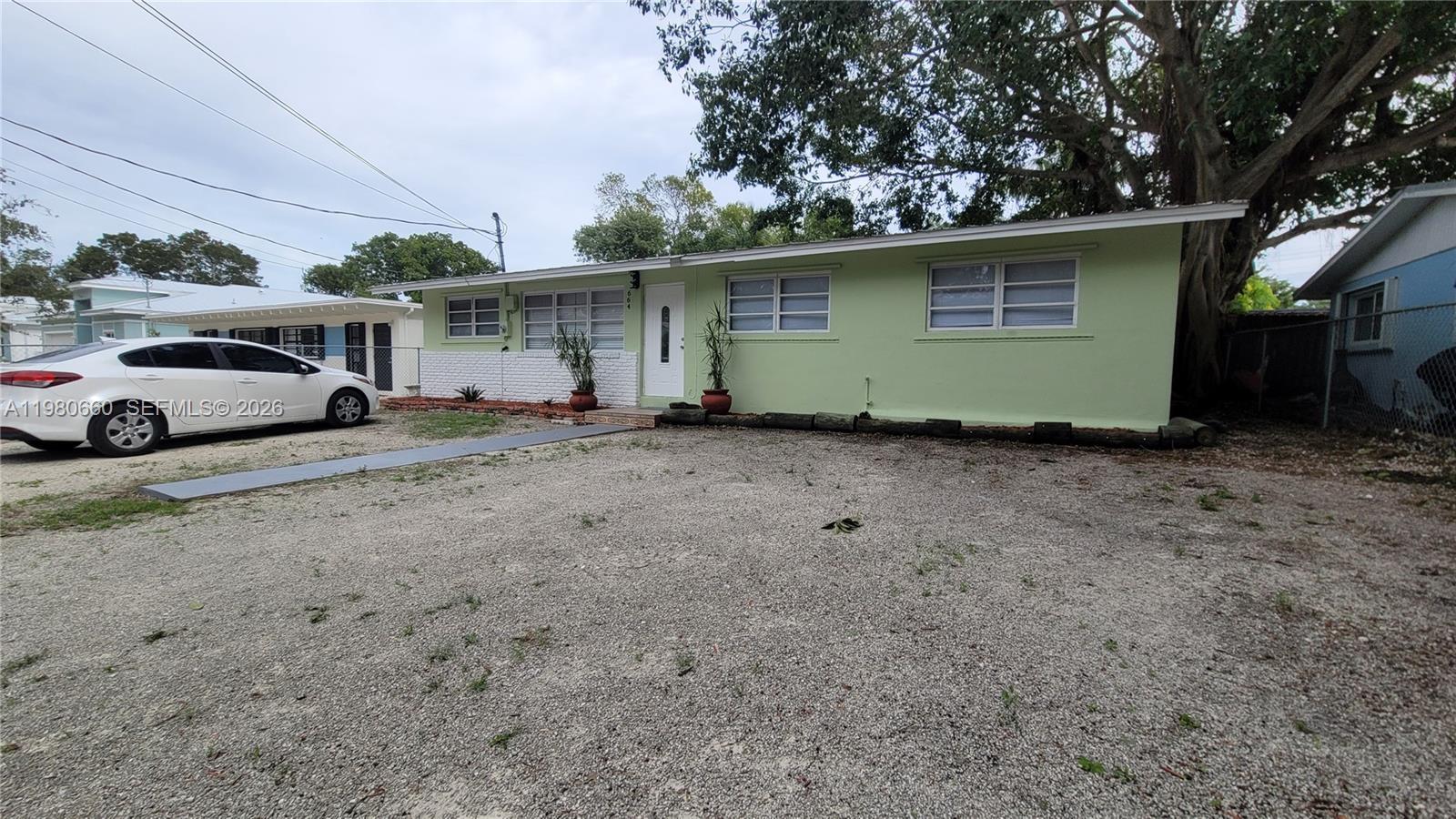 664 Colson Drive Key Largo, FL 33037 - Photo 2 of 23 a view of a house with backyard space