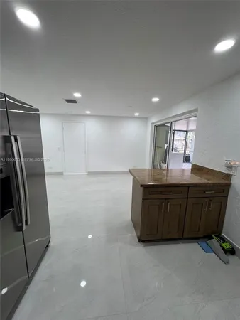 a room with furniture and a window