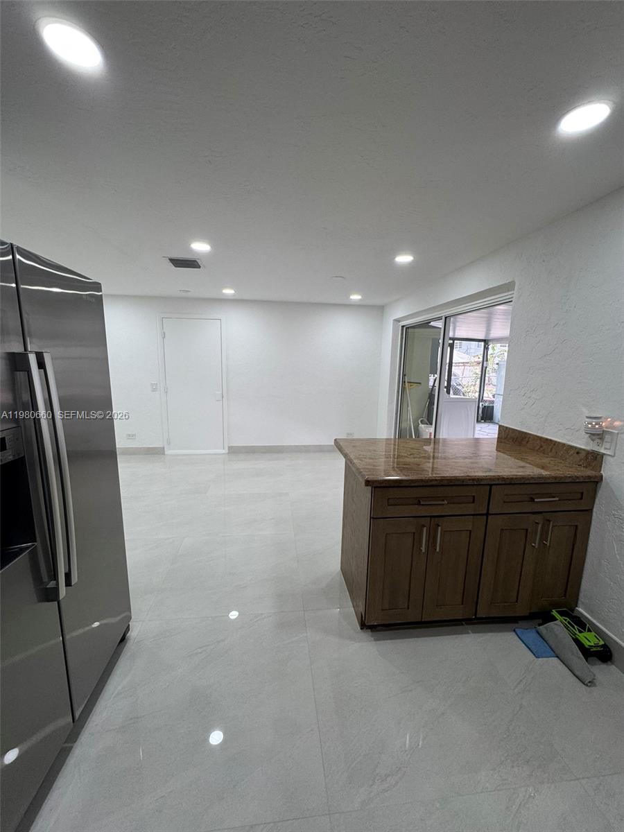 664 Colson Drive Key Largo, FL 33037 - Photo 8 of 23 a room with furniture and a window