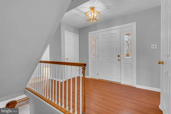 a view of livingroom and hardwood floor