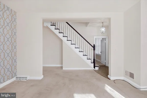 a view of hallway with stairs