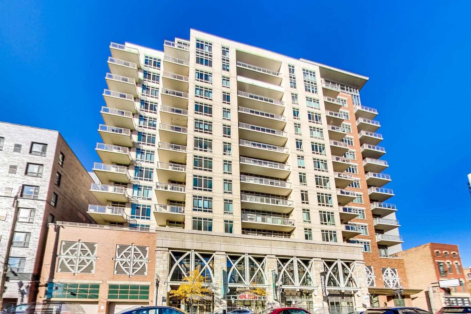 230 West Division Street, Unit 1307 Chicago, IL 60610 - Photo 1 of 33 front view of a building