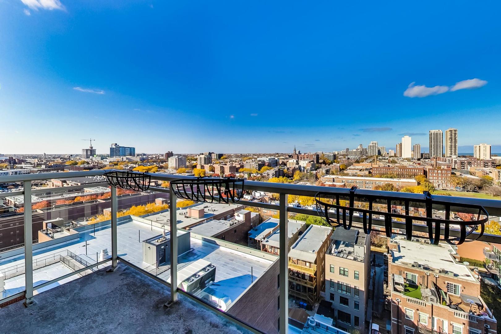 230 West Division Street, Unit 1307 Chicago, IL 60610 - Photo 12 of 33 a view of a balcony with chairs