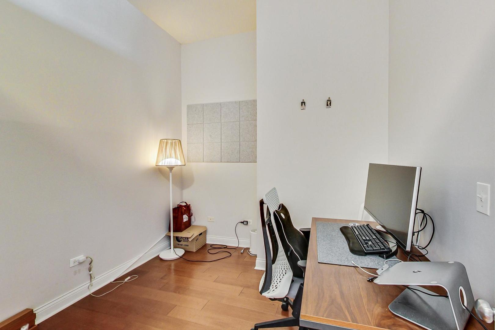 230 West Division Street, Unit 1307 Chicago, IL 60610 - Photo 20 of 33 a view of a workspace with furniture