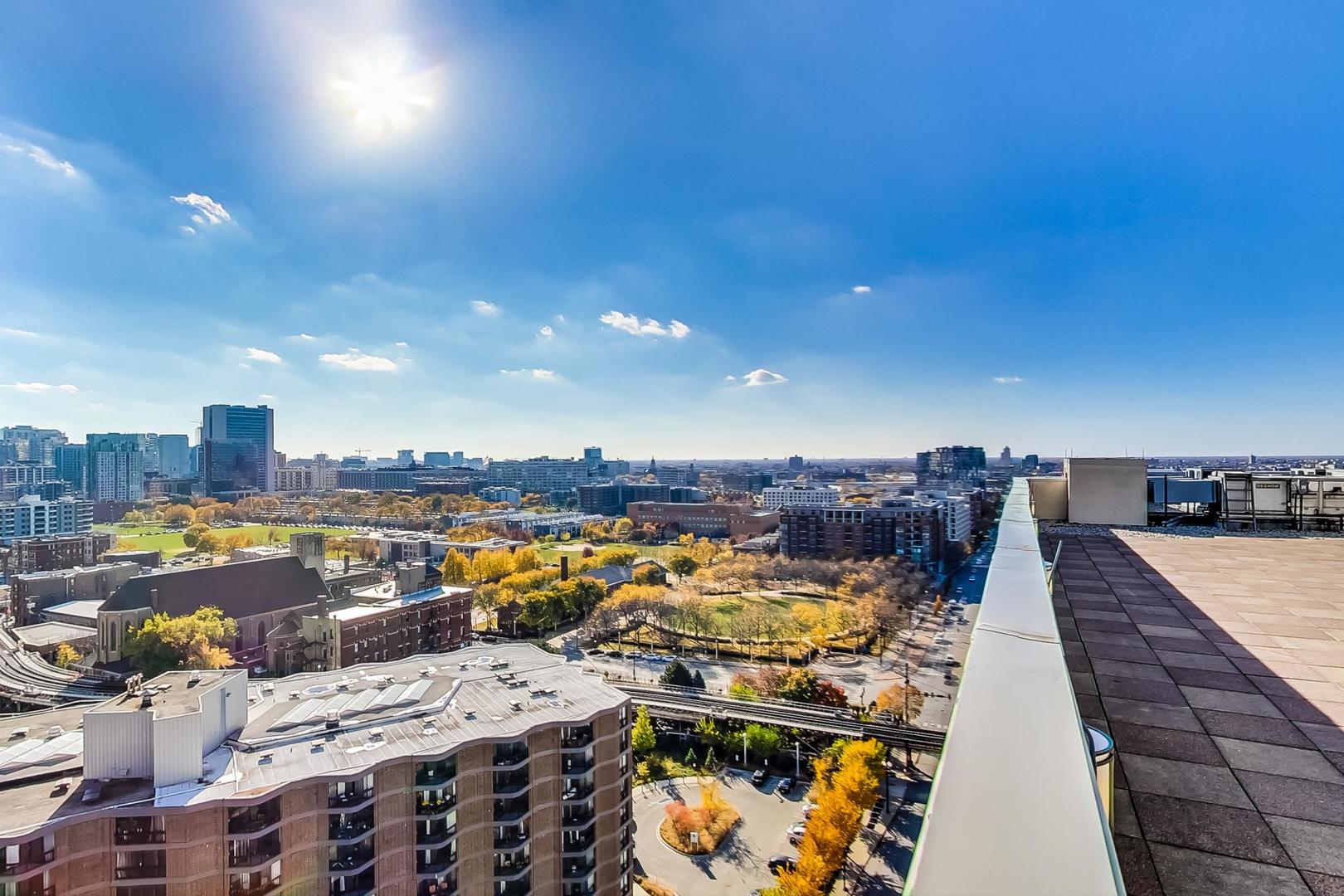 230 West Division Street, Unit 1307 Chicago, IL 60610 - Photo 30 of 33 a view of a balcony with chairs