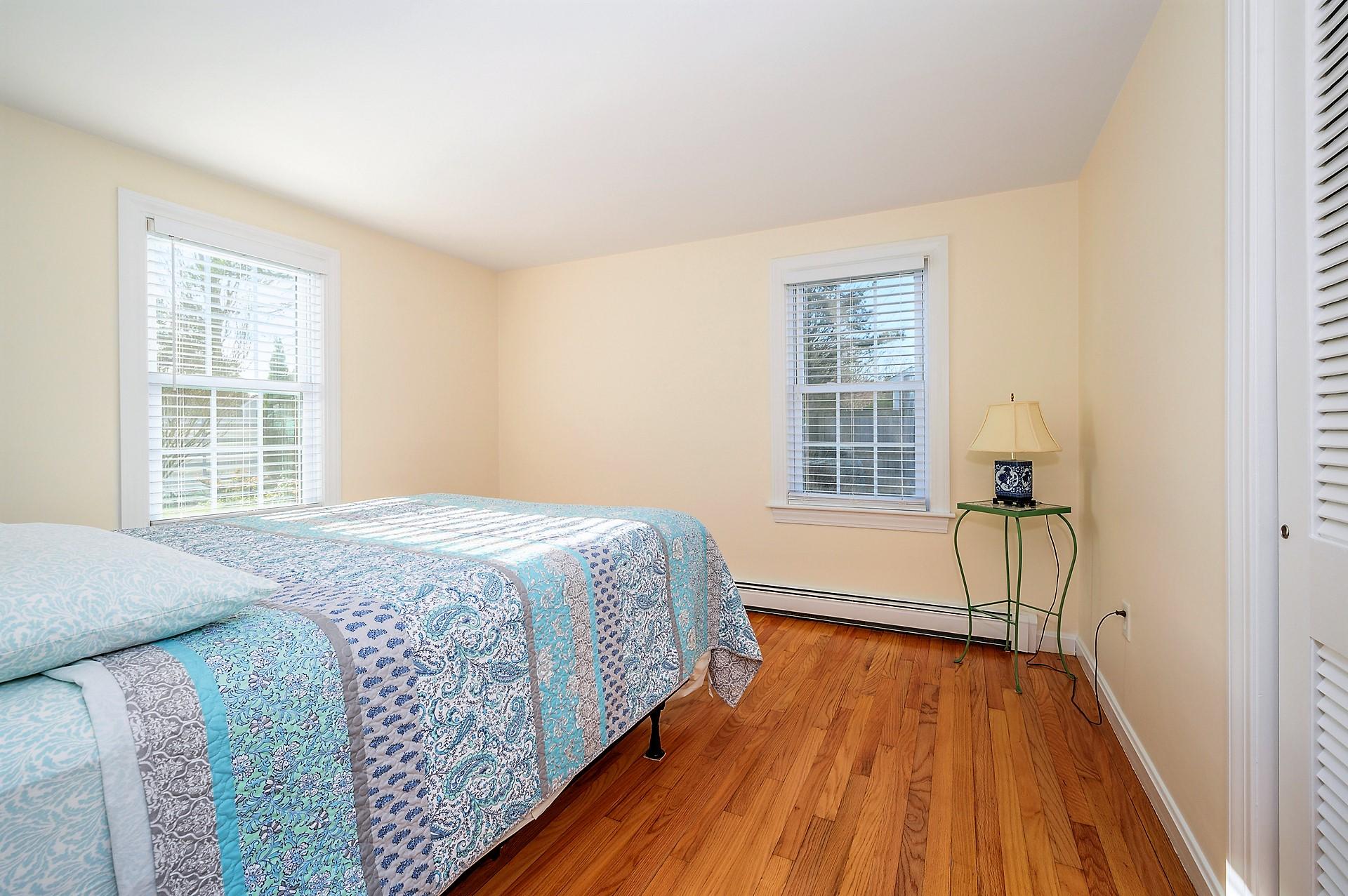 15 Captain Small Road South Yarmouth, MA 02664 - Photo 12 of 17 a bedroom with a bed and a window