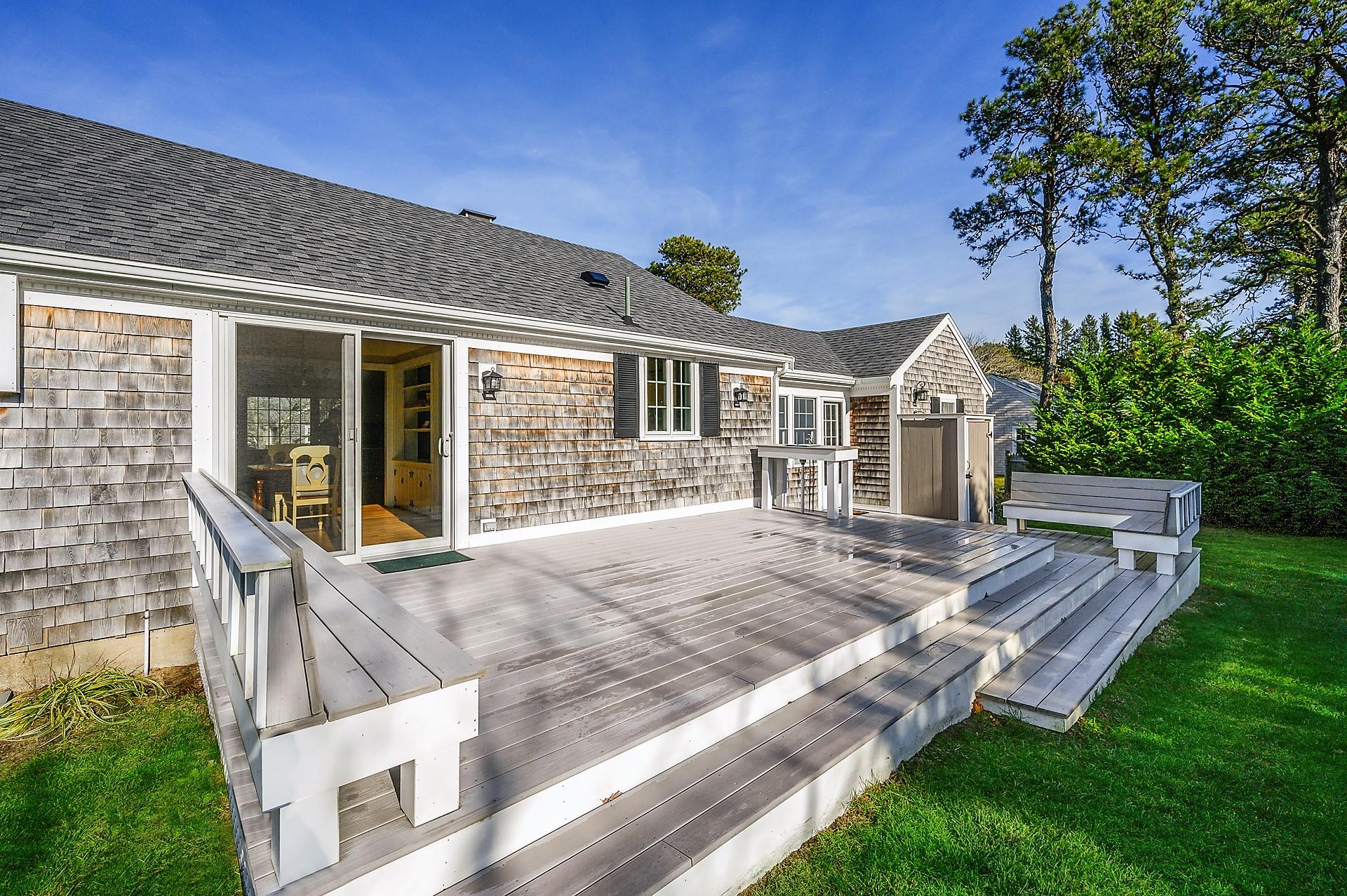 15 Captain Small Road South Yarmouth, MA 02664 - Photo 2 of 17 a view of house with backyard and porch