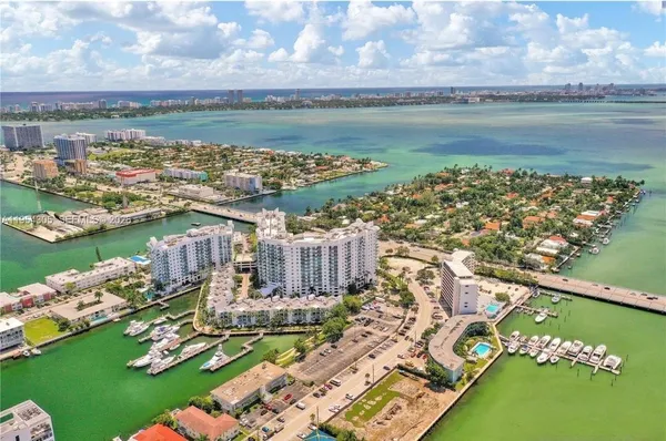 a view of a city with an ocean
