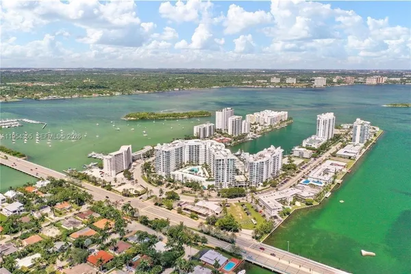 a view of a lake with a city