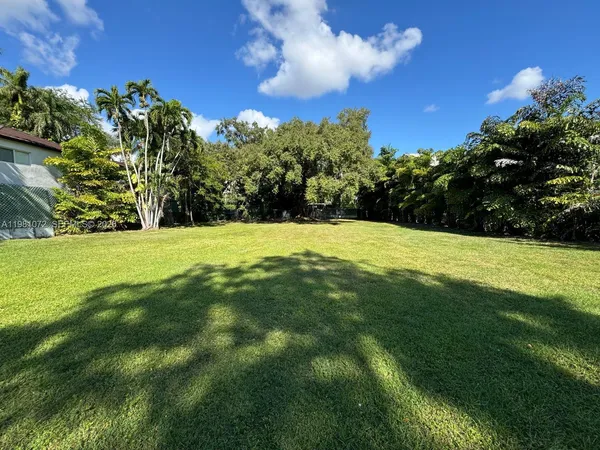 a view of an outdoor space and a yard