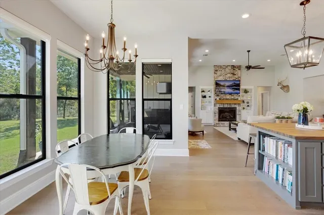 a kitchen with stainless steel appliances granite countertop a stove and refrigerator