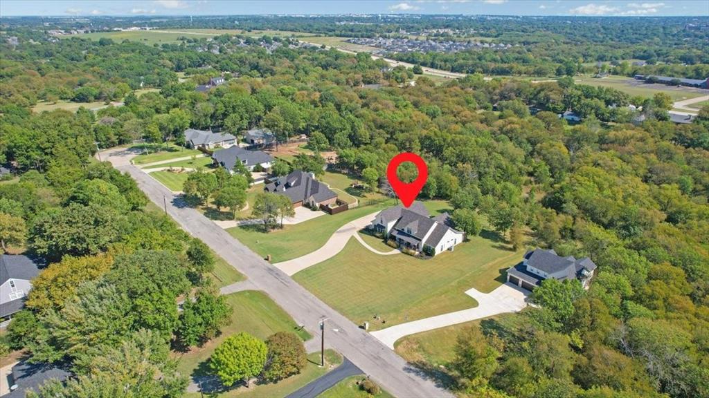 425 Ridgeview Road Sherman, TX 75092 - Photo 39 of 40 a view of a wooden house with a yard and potted plants