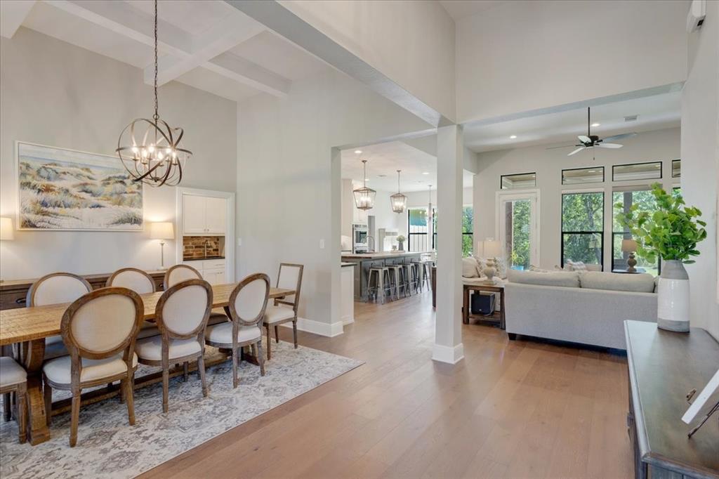 425 Ridgeview Road Sherman, TX 75092 - Photo 7 of 40 a living room with furniture and a chandelier