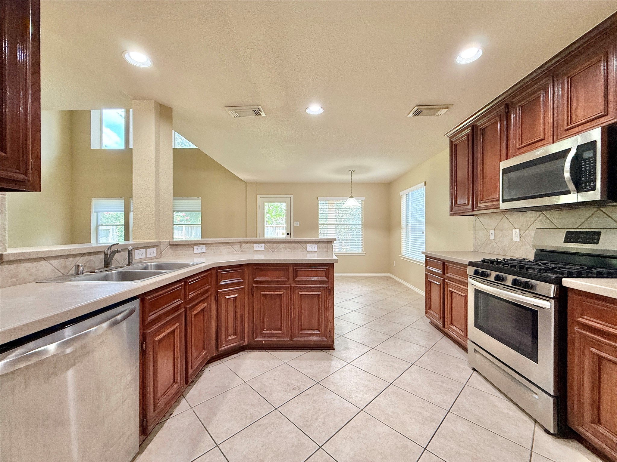 1810 Katlyn Lane Spring, TX 77386 - Photo 15 of 48 Large kitchen overlooks family room