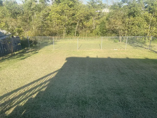 a view of an outdoor space and a lake view