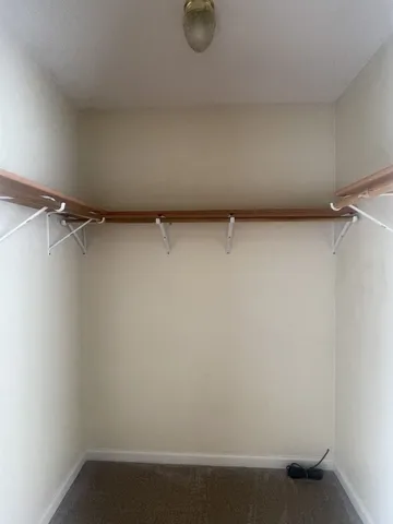 a view of small space with racks on the wall