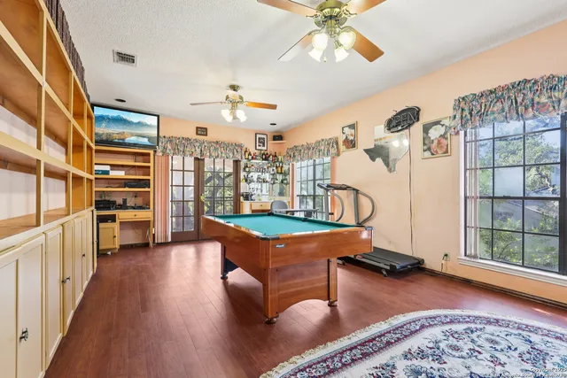 a room with furniture and a wooden floor