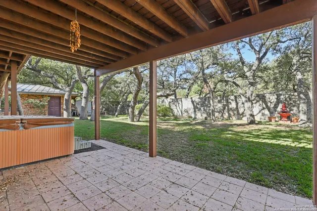 a view of a porch with a garden