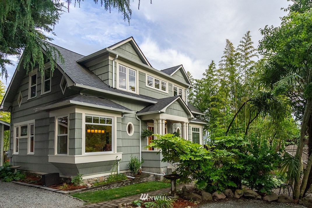 8320 Renton Avenue South Seattle, WA 98118 - Photo 1 of 39 a front view of a house with garden