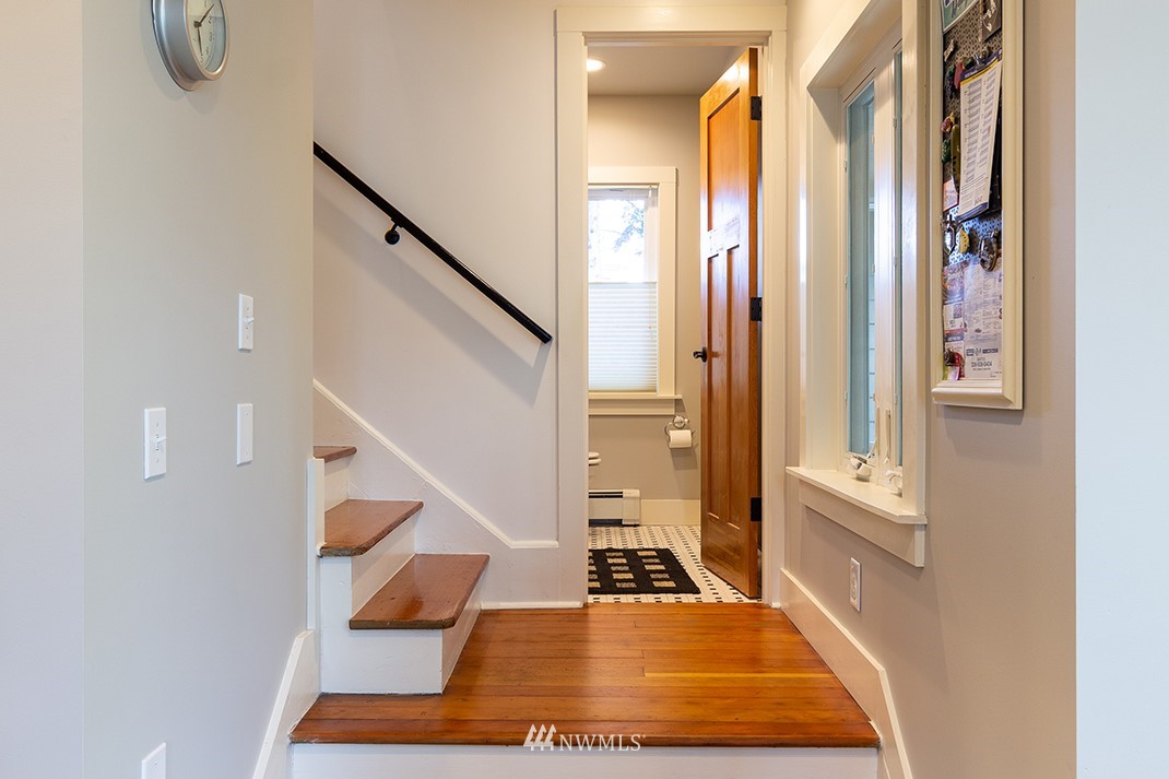 8320 Renton Avenue South Seattle, WA 98118 - Photo 15 of 39 a view of entryway and hall with wooden floor