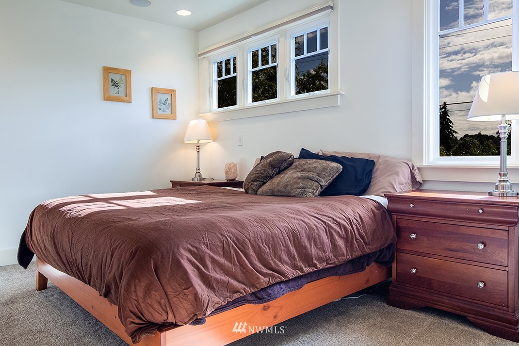 8320 Renton Avenue South Seattle, WA 98118 - Photo 17 of 39 a bedroom with a bed and window