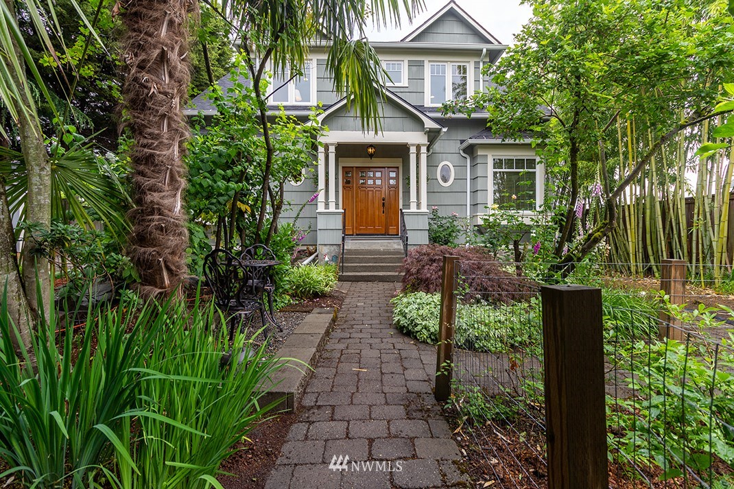 8320 Renton Avenue South Seattle, WA 98118 - Photo 39 of 39 a front view of a house with garden
