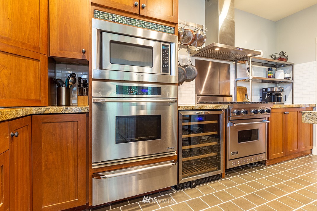 8320 Renton Avenue South Seattle, WA 98118 - Photo 9 of 39 a kitchen with a stove and a microwave