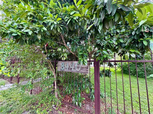 a view of a house with swimming pool