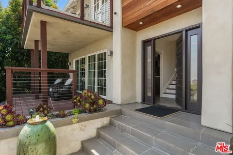 a view of a entryway door front of house