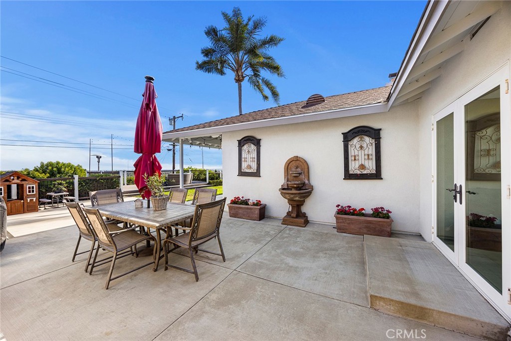 15914 West Road Whittier, CA 90603 - Photo 39 of 47 a view of a dinning table and chairs in patio of the house