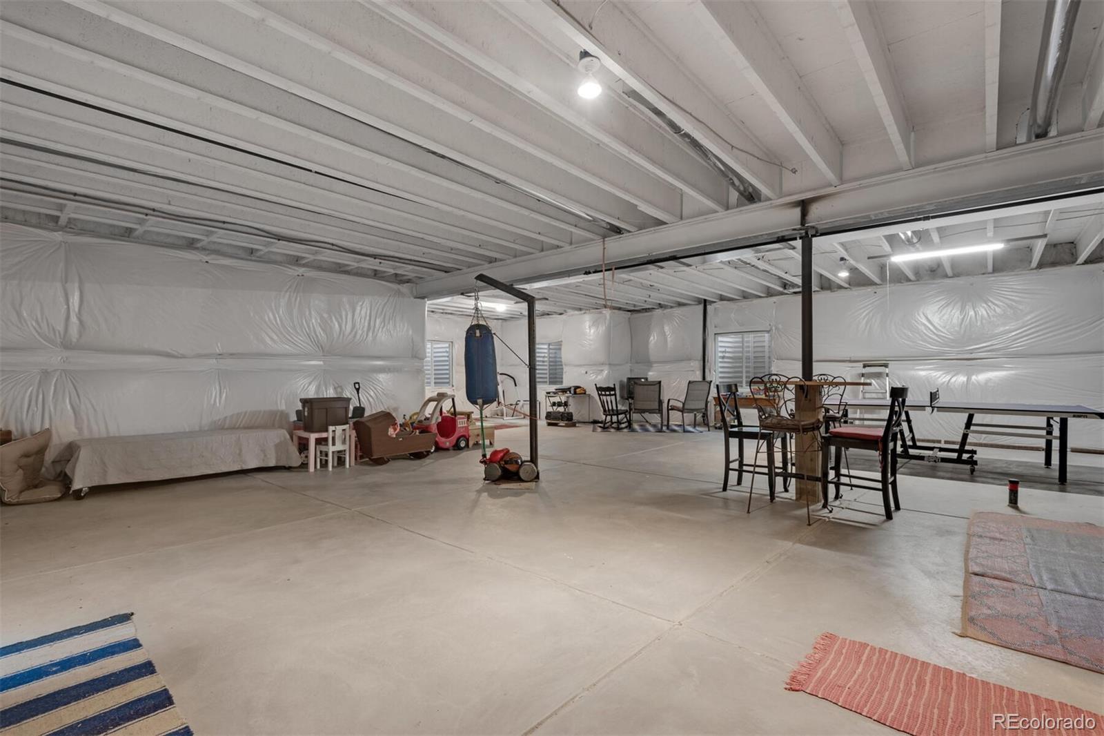 12646 Eagle River Road Firestone, CO 80504 - Photo 19 of 40 a view of a garage with furniture