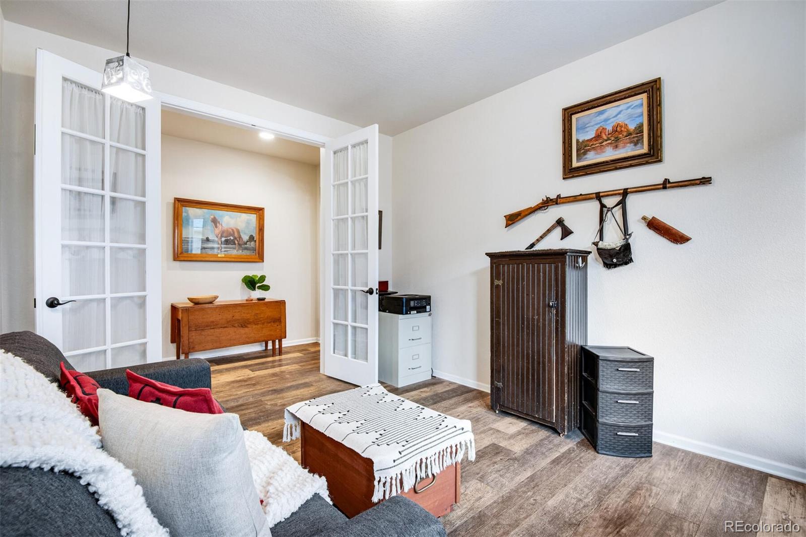 12646 Eagle River Road Firestone, CO 80504 - Photo 27 of 40 a living room with furniture and a table