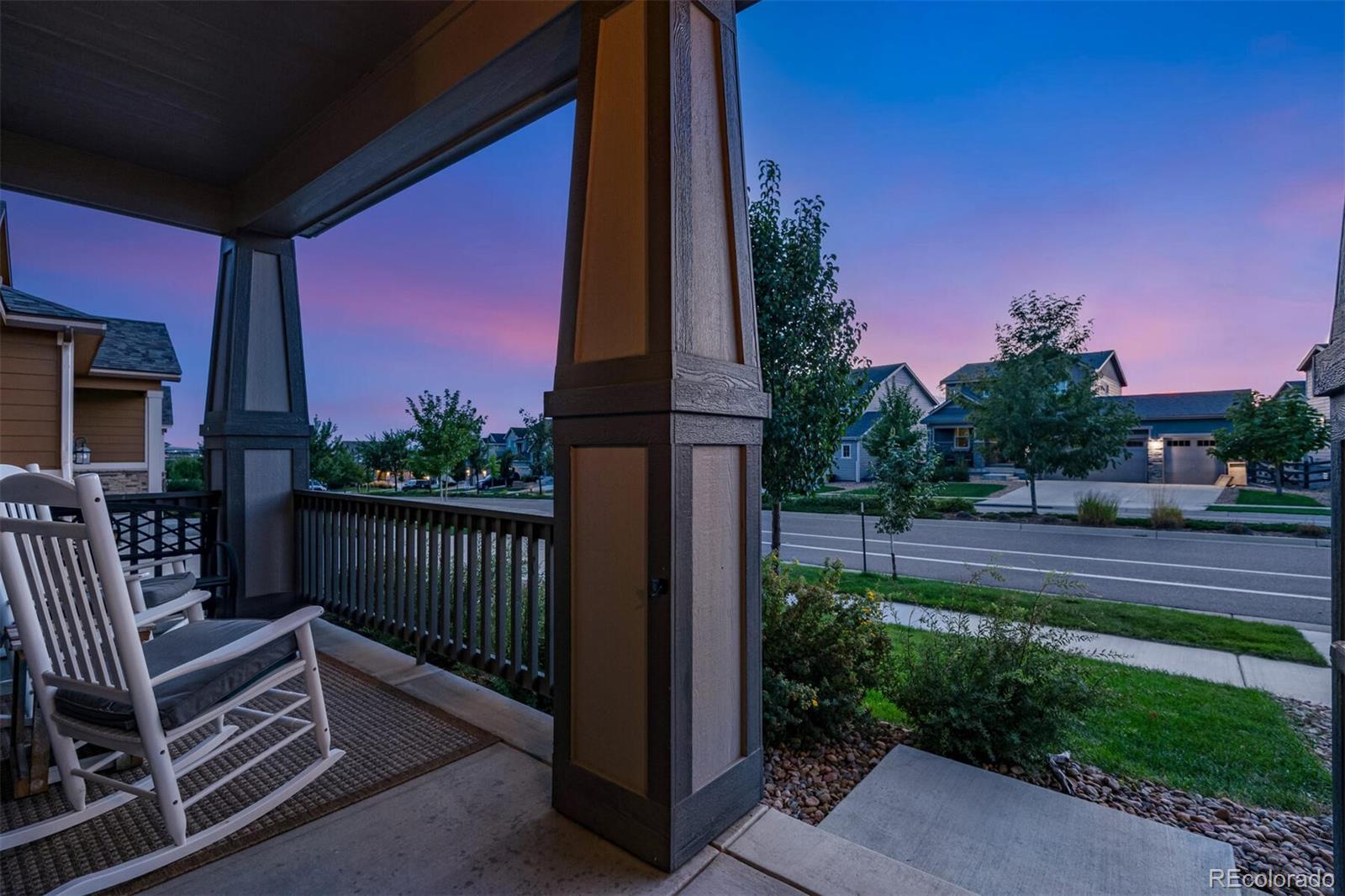 12646 Eagle River Road Firestone, CO 80504 - Photo 40 of 40 a view of a porch with a yard