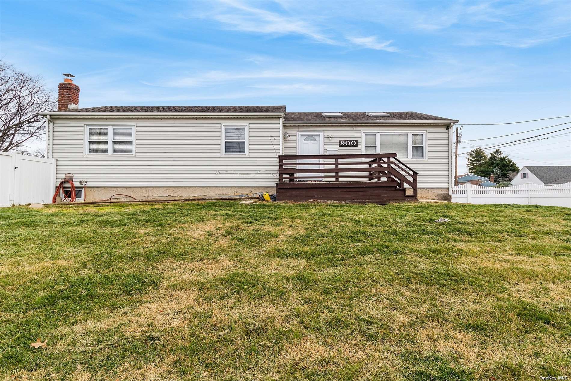 a view of a house with a big yard