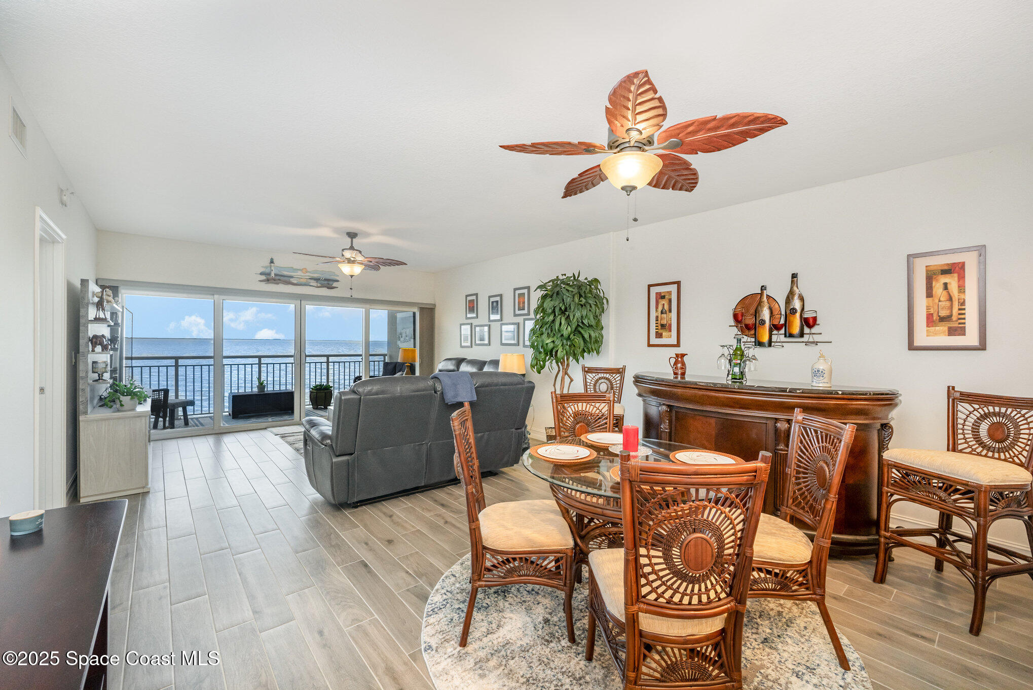 1825 Riverside Drive, Unit 202 Titusville, FL 32780 - Photo 12 of 31 a living room with furniture and a kitchen view