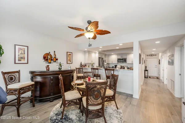 a view of a dining room with furniture