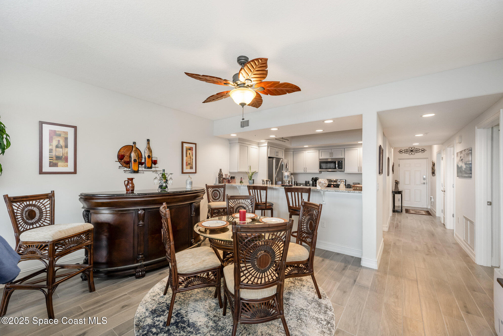 1825 Riverside Drive, Unit 202 Titusville, FL 32780 - Photo 13 of 31 a view of a dining room with furniture