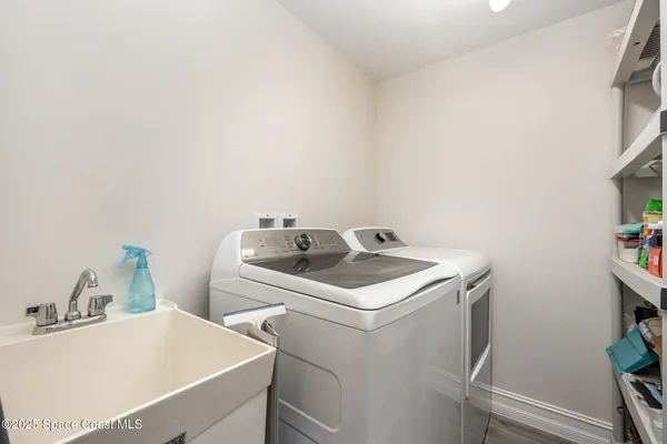 a utility room with dryer and washer
