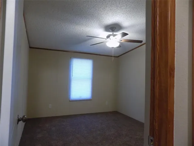 a house view with a backyard space