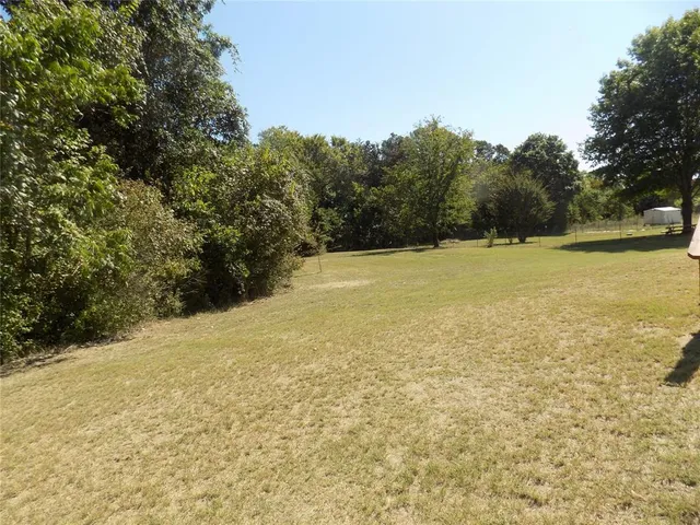 a view of outdoor space and yard