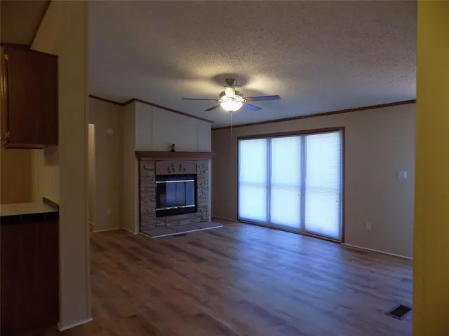 a living room with a fireplace