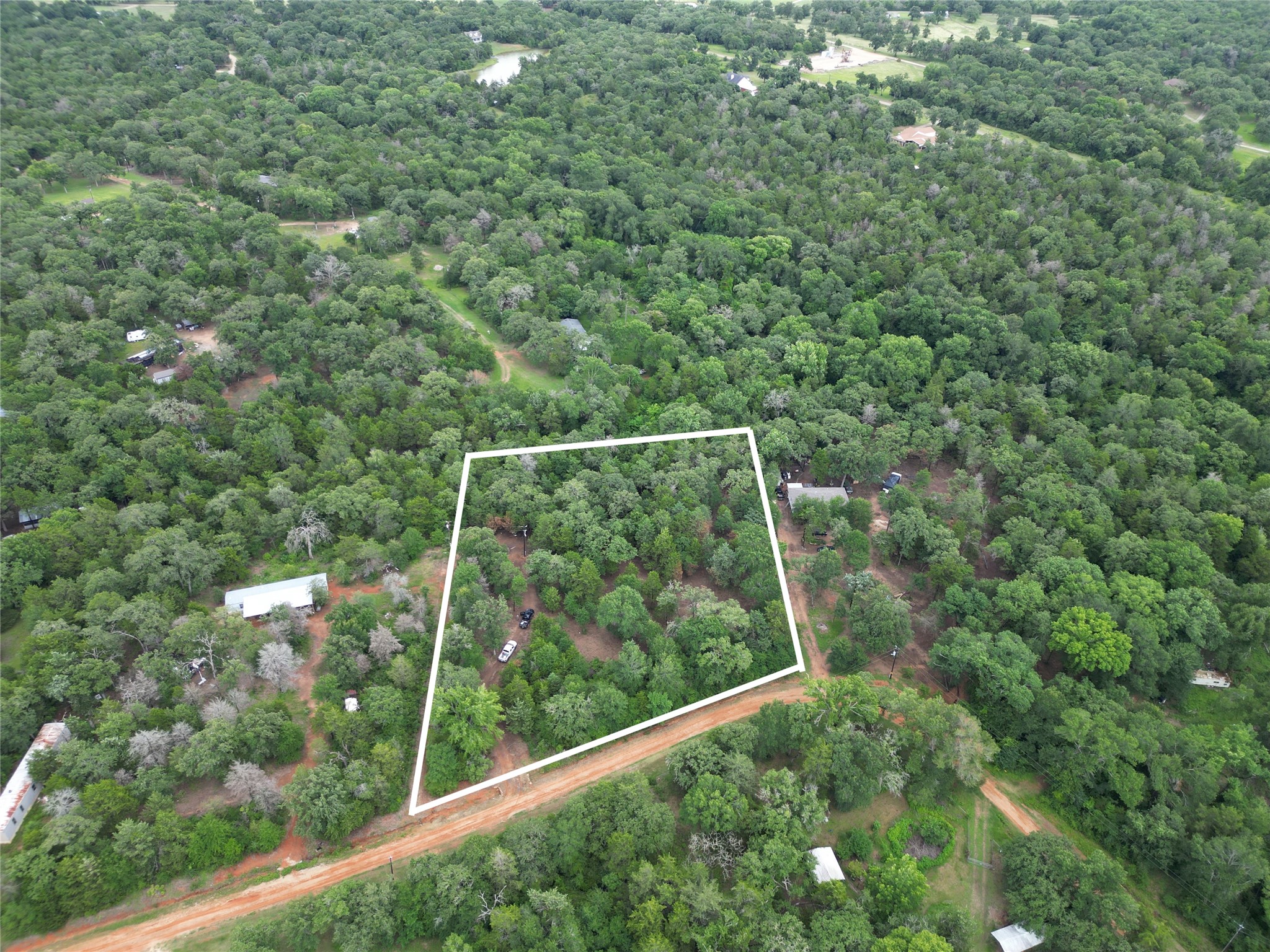 891 Cedar Creek Road Caldwell, TX 77836 - Photo 3 of 18 a view of a yard from a window