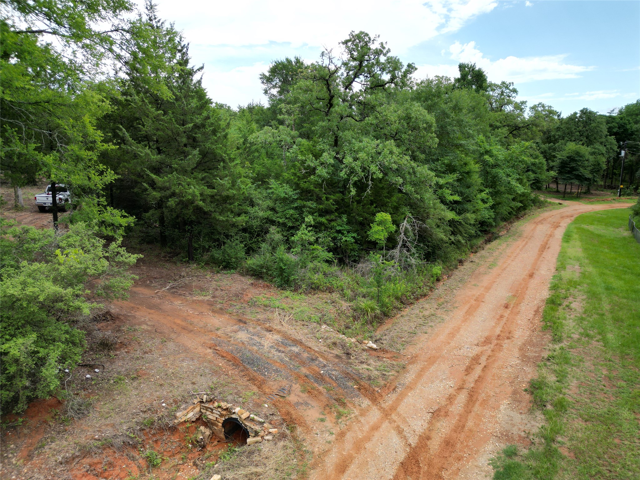 891 Cedar Creek Road Caldwell, TX 77836 - Photo 7 of 18 a view of a road with a yard