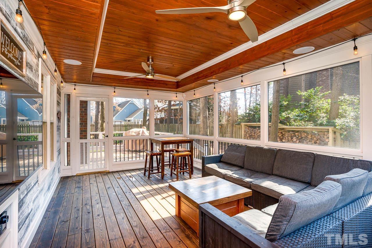 8904 Cub Trail Raleigh, NC 27615 - Photo 12 of 12 Massive Screened-In Porch off of the Kitchen