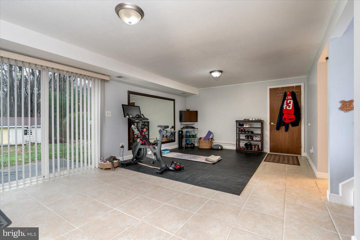 6343 Meadowland Drive Dunkirk, MD 20754 - Photo 22 of 31 a view of a room with gym equipment