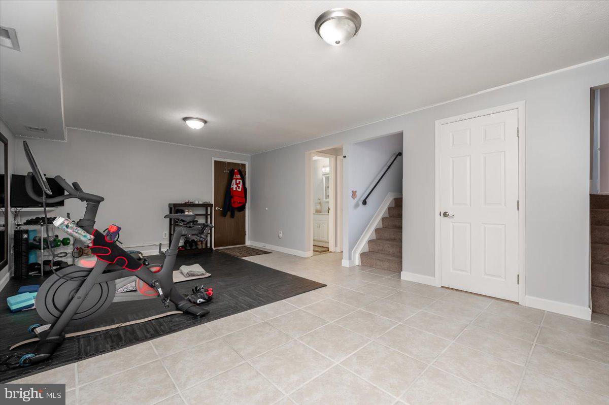 6343 Meadowland Drive Dunkirk, MD 20754 - Photo 23 of 31 a view of a room with gym equipment