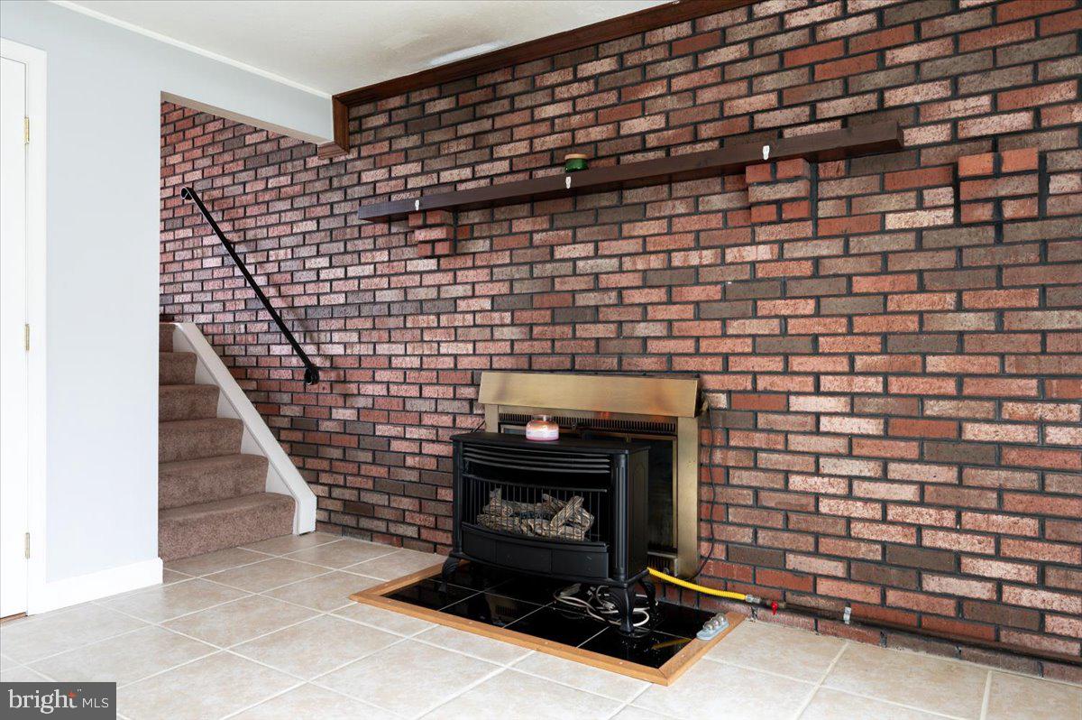 6343 Meadowland Drive Dunkirk, MD 20754 - Photo 26 of 31 a room with fireplace